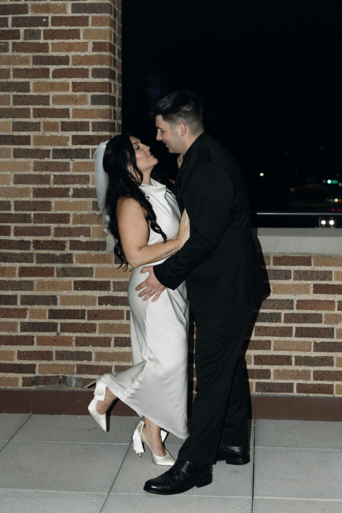 Couple enjoying a quiet moment together on the balcony at Hotel 1928.
