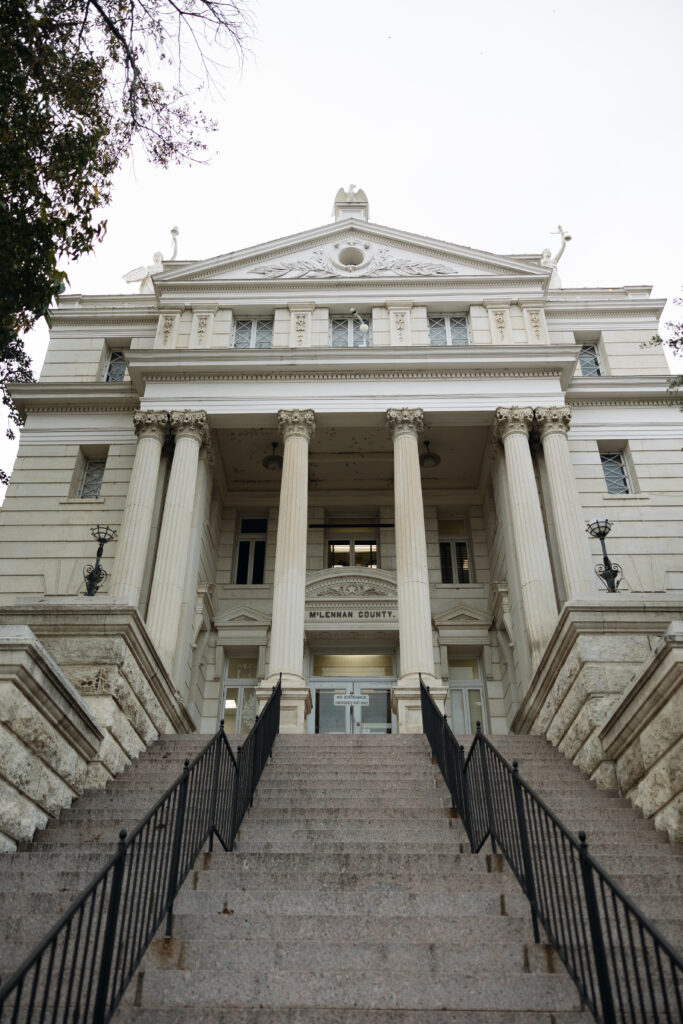 Wide shot of the historic Waco courthouse during a Waco elopement.