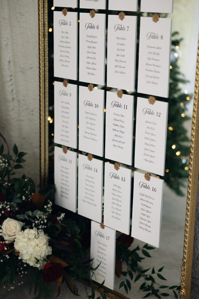 Christmas wedding reception details with warm tones and winter florals in Waco
