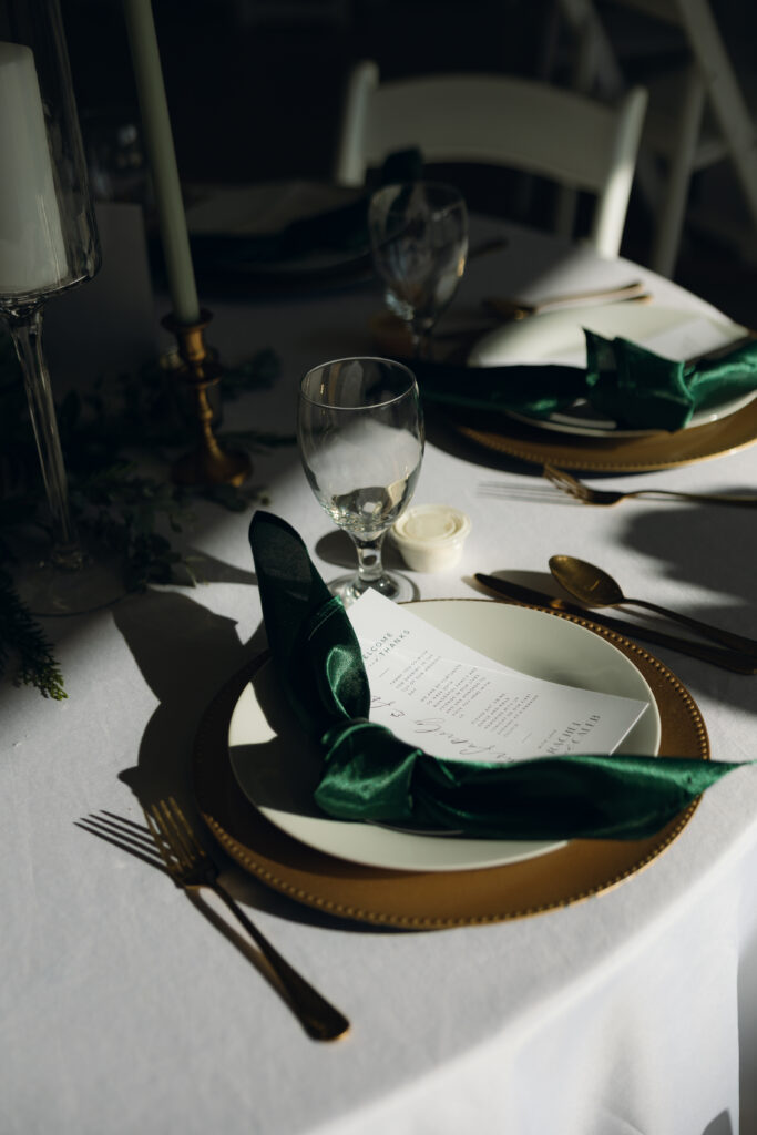 Reception space decorated with soft lighting for a winter wedding in Waco