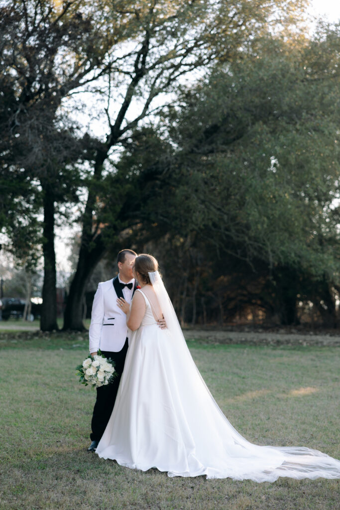 Bride and groom sharing a quiet moment during their Christmas wedding in Waco, Texas